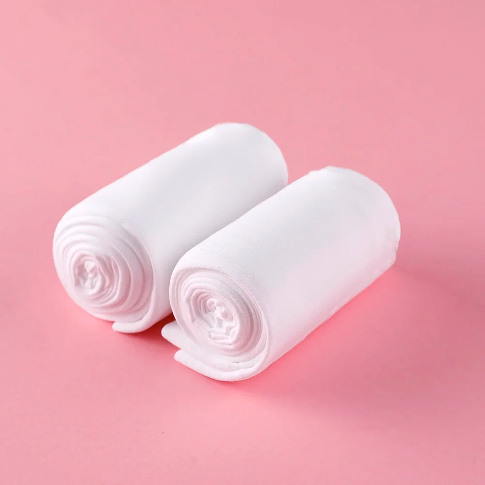 Collants danse avec pieds pour enfants coloris beige ou blanc