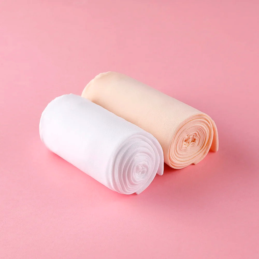 Collants danse avec pieds pour enfants coloris beige ou blanc