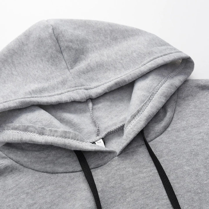 Sweat-shirt à capuche manches rayures