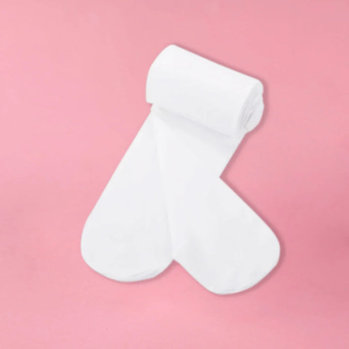 Collants danse avec pieds pour enfants coloris beige ou blanc