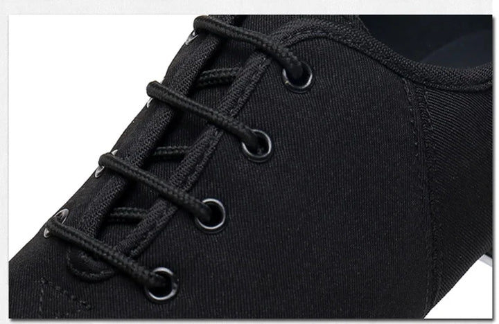 Chaussures de Claquettes unisexe Claude coloris noir ou rouge