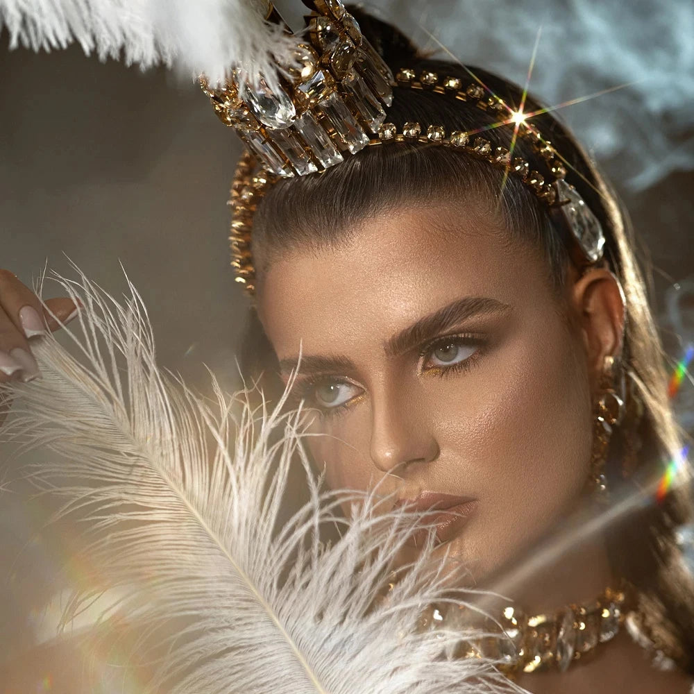 Coiffe Zora strass et plumes blanches