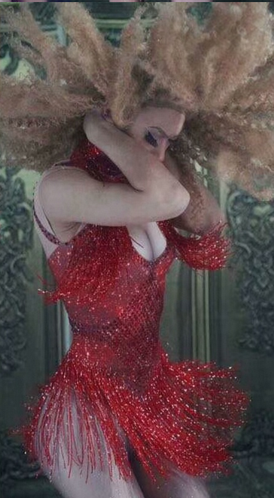 Justaucorps extensible avec franges et strass